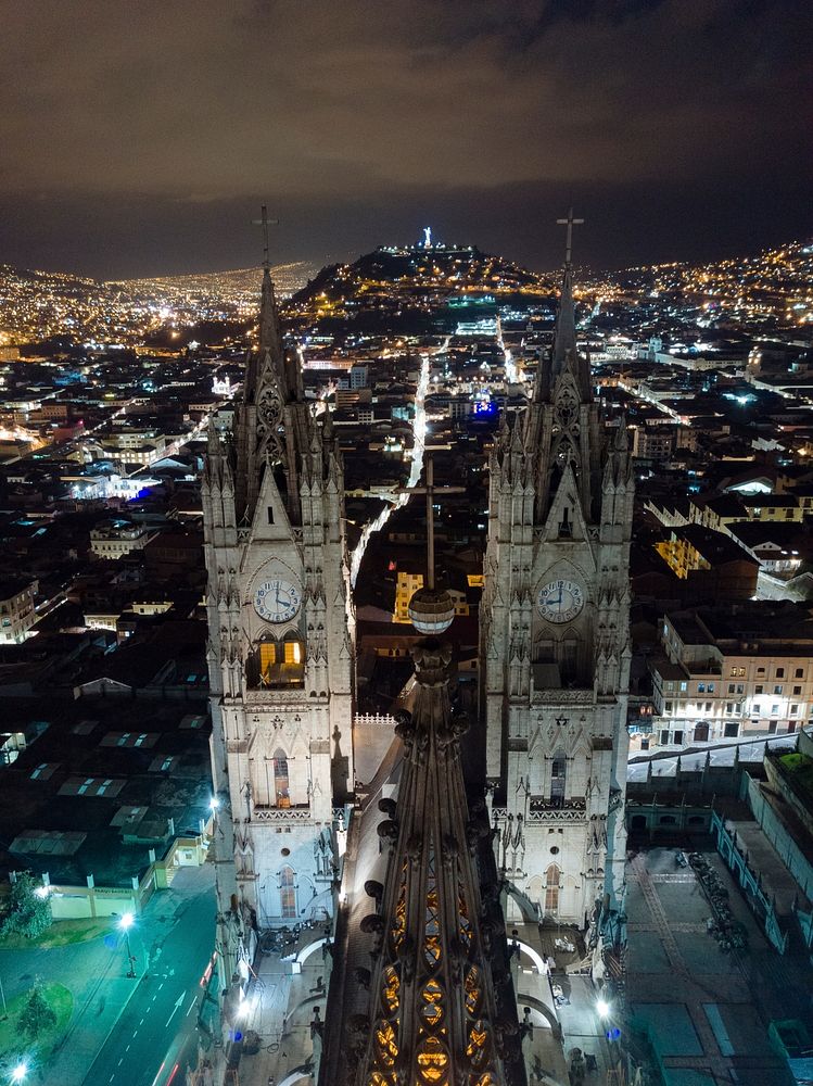 Clock Tower of The Basilica of the National Vow in Quito, Ecuador during night. Free public domain CC0 photo.