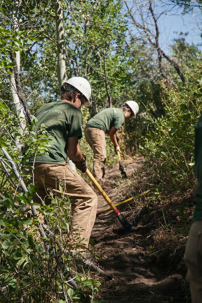 Widening the Trail, Cami and Jeremy work with picks to widen the trail they already made. Nevada Conservation Crew widening…