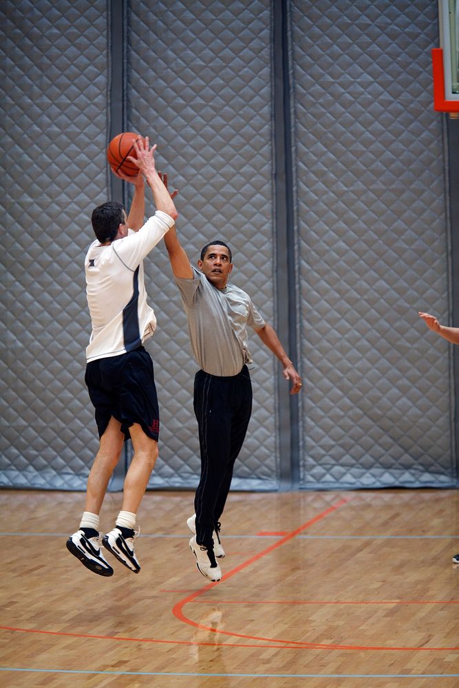 President Barack Obama plays basketball with Education Secretary Arne Duncan at the U.S. Department of Interior, Washington…