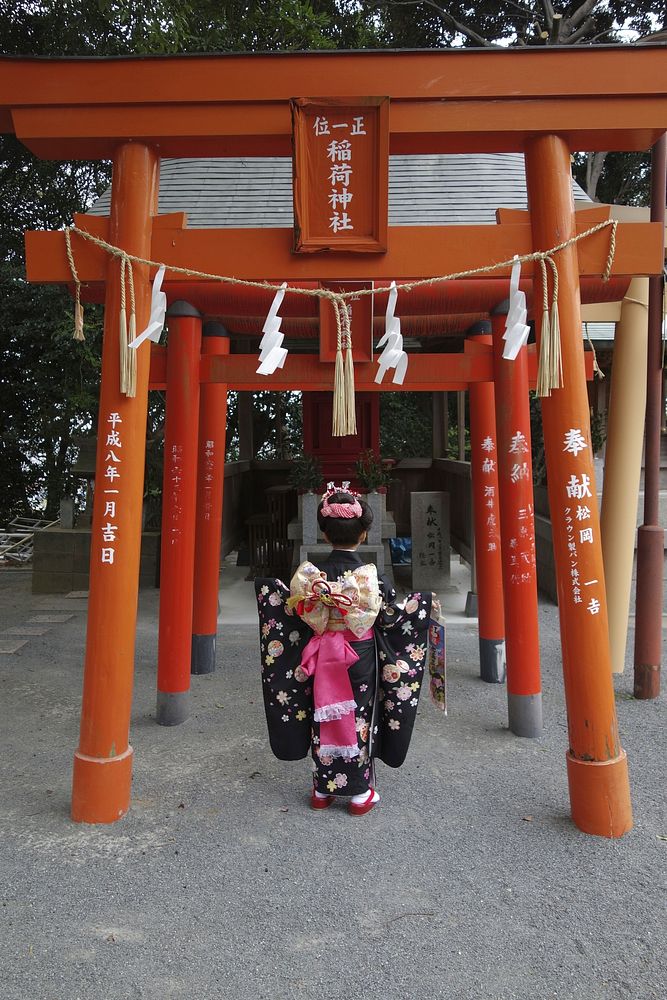 Japanese woman at shrine. Free public domain CC0 photo.