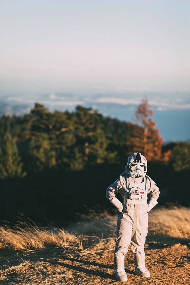 Free man wearing Starwars costume standing public domain CC0 photo.