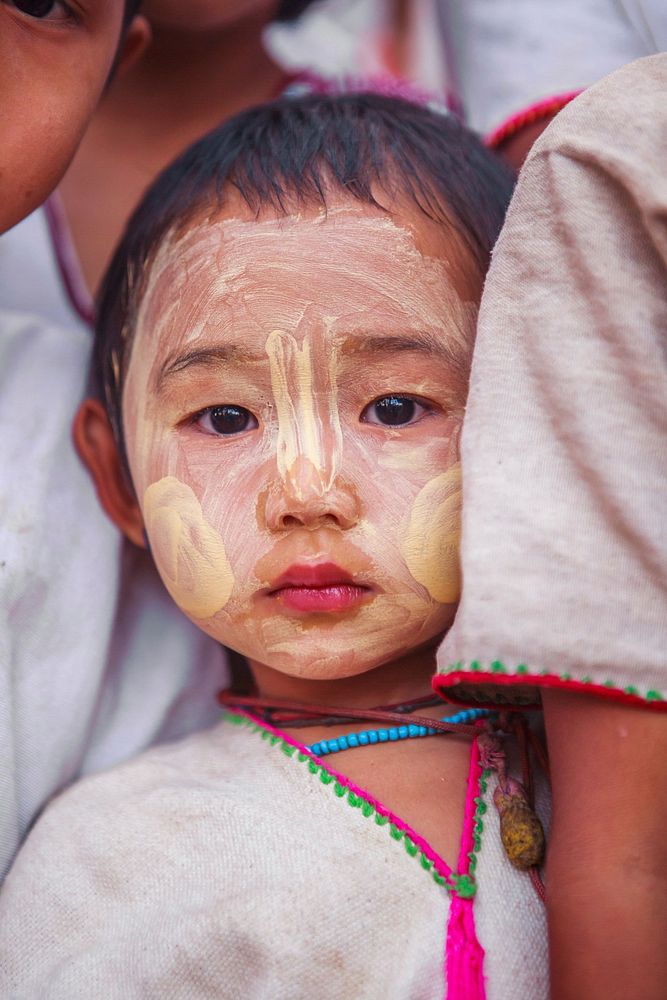 Karen child with tanaka powder on face, Myanmar - unknown date
