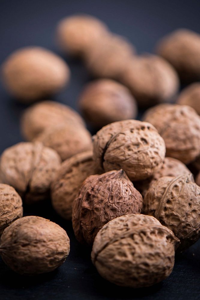 Closeup on unopened walnuts. Free public domain CC0 photo.