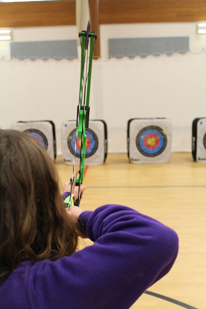 Archery, sports photography. Free public domain CC0 photo.
