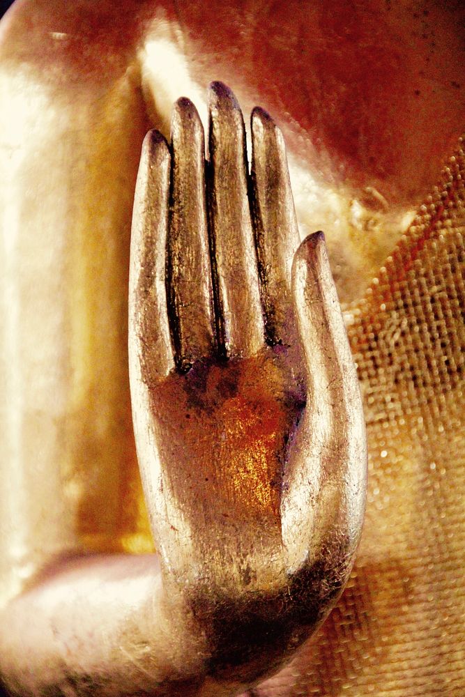 Buddha's hand golden statue background. Free public domain CC0 photo.