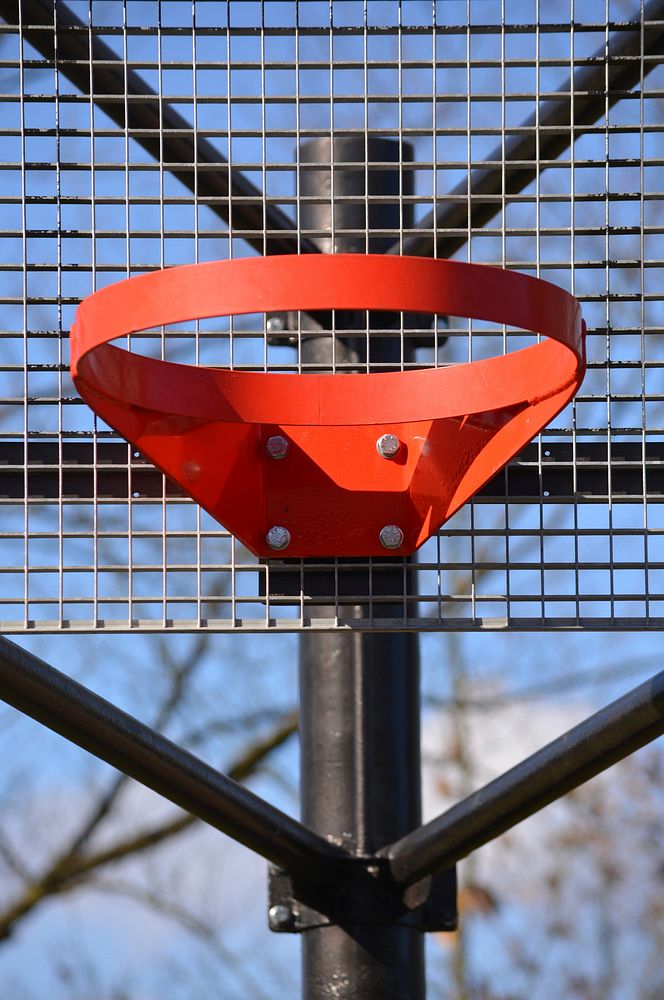 Closeup on an outdoor basketball hoop. Free public domain CC0 photo.