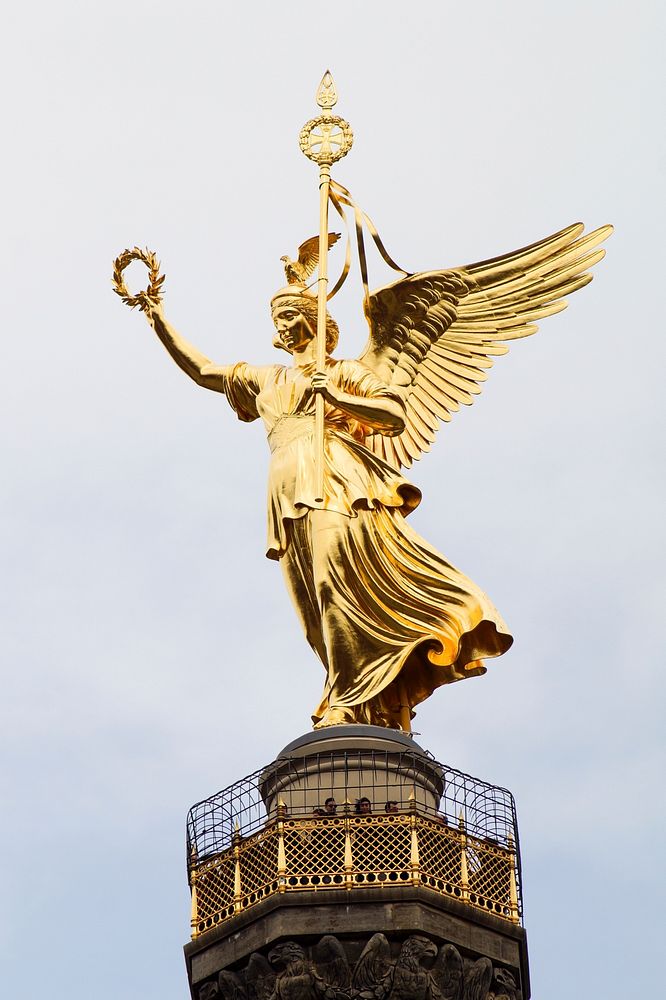 Statue of goddess of Fama or Pheme, Academy of Art in Dresden, Saxony, Germany. Free public domain CC0 photo.