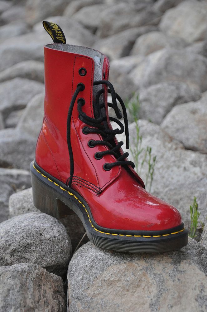 Red boot on rocks. Free public domain CC0 image.