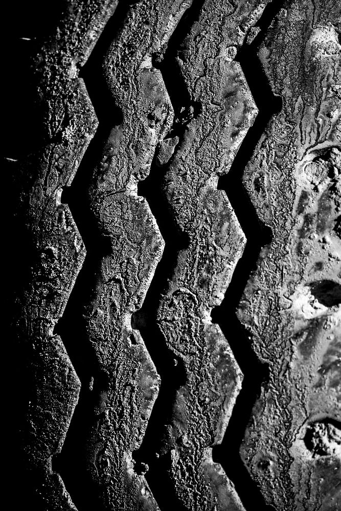 Close up car tire print on soil. Free public domain CC0 photo.