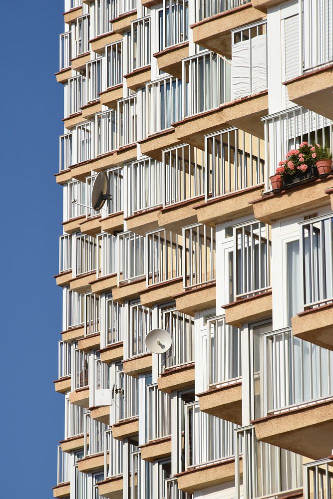 Building window balconies close up. Free public domain CC0 image.