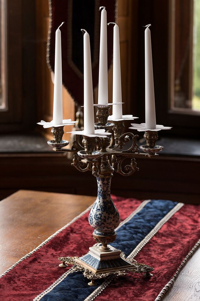 Candelabra on table. Free public domain CC0 photo.