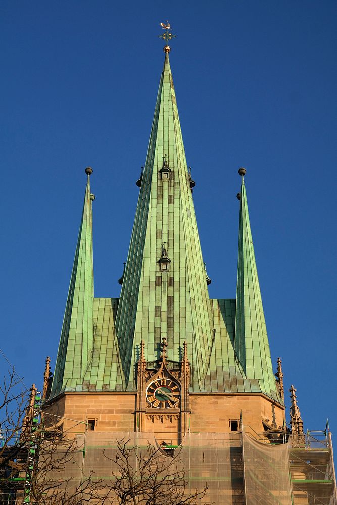 Historical church architecture with a clock tower. Free public domain CC0 image.