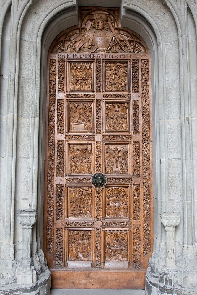 Carved wooden door. Free public domain CC0 photo.