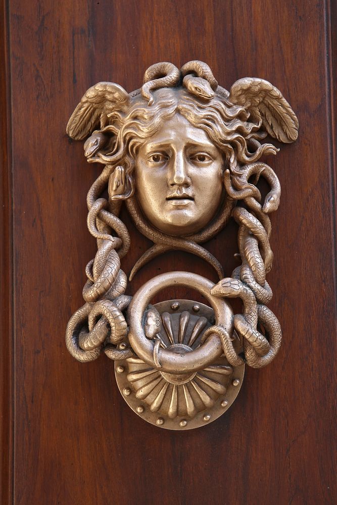 Vintage door knocker. Free public domain CC0 photo.