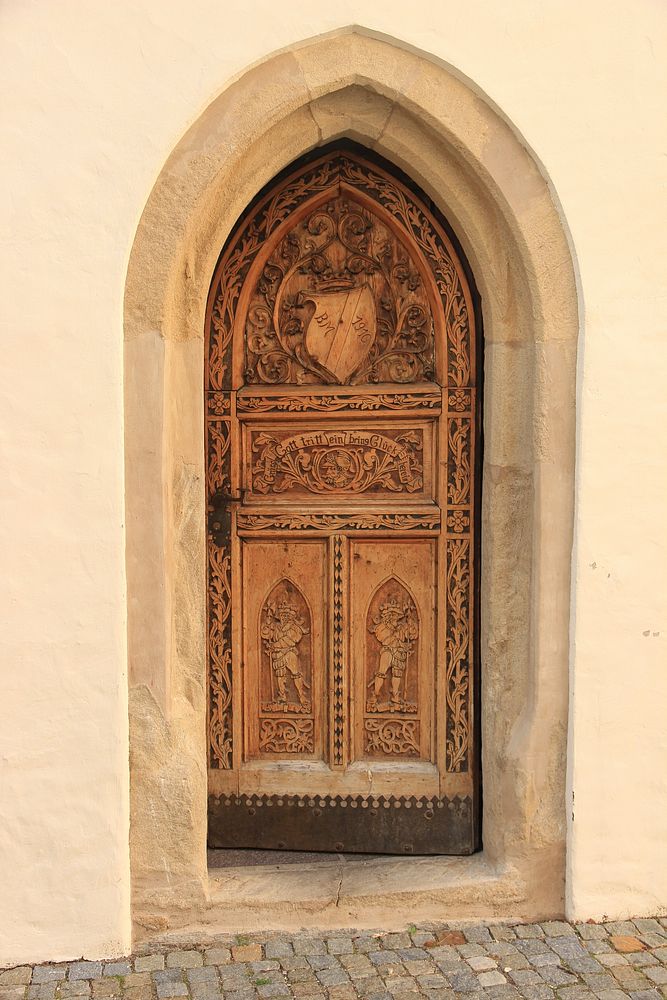 Old arched wooden door. Free public domain CC0 photo.