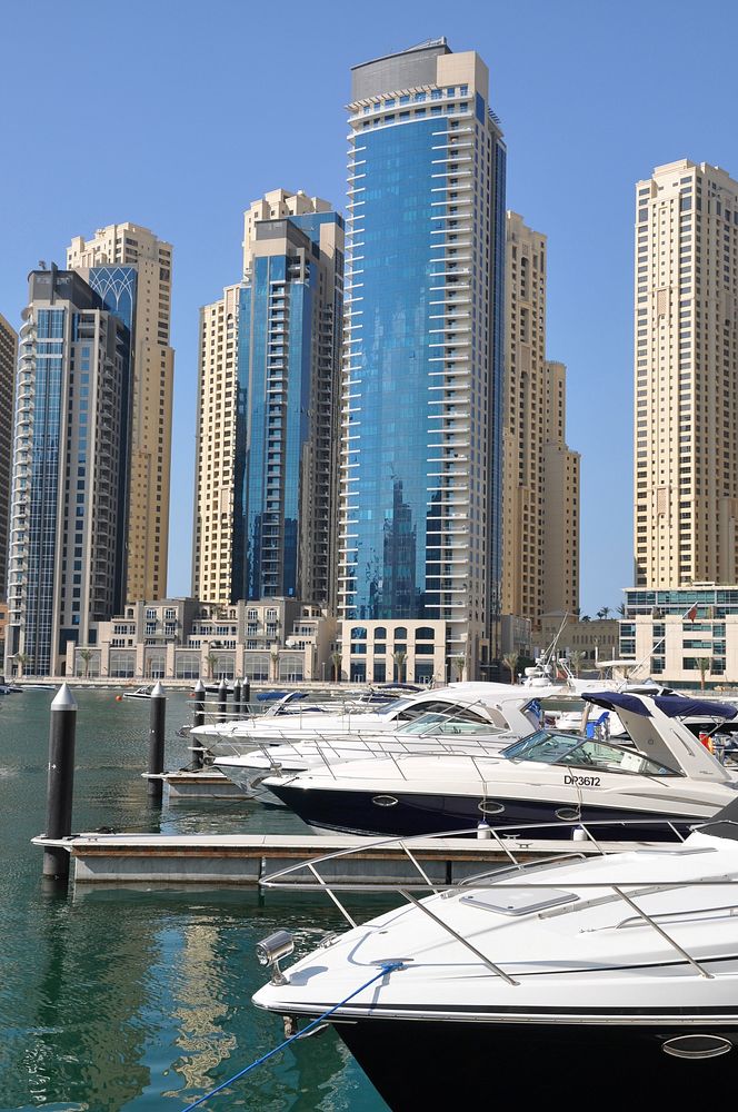 Yacht docking by the marina. Free public domain CC0 photo.