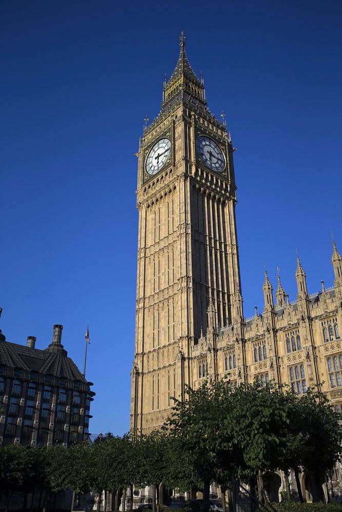 Big Ben clock tower at the north end of the Palace of Westminster in London, England. Free public domain CC0 photo.