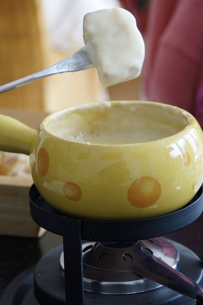 Closeup on cheese fondue. Free public domain CC0 image.