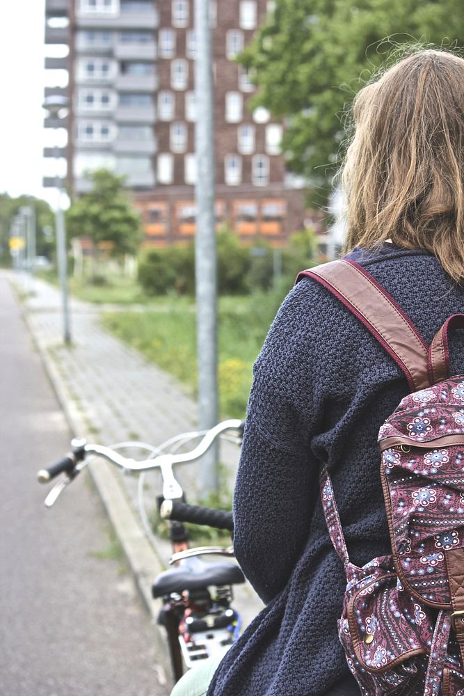 Girl biking. Free public domain CC0 photo.