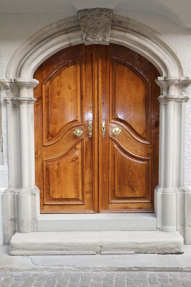 Old arched wooden door. Free public domain CC0 photo.