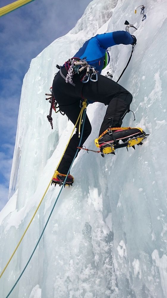 Climbing on ice, extreme sports photography. Free public domain CC0 photo.