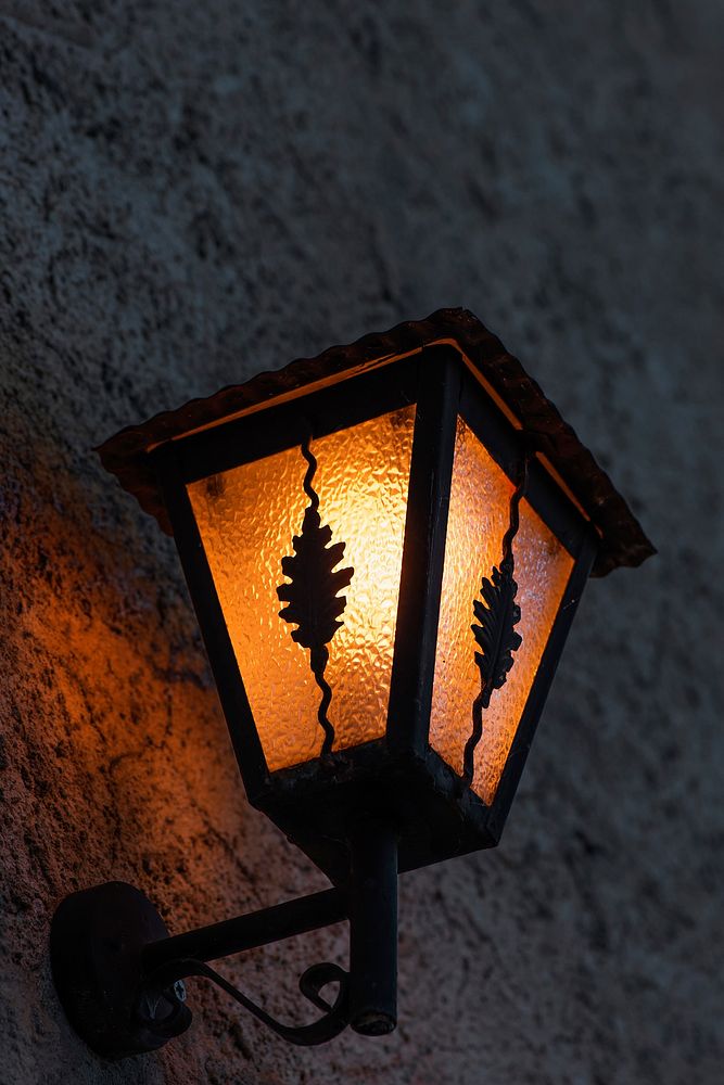 Warm light wall lamp. Free public domain CC0 photo.