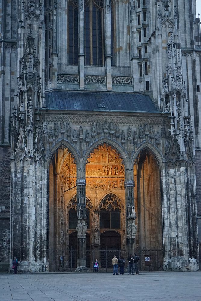 Historical cathedral architecture facade with tourists. Free public domain CC0 image.