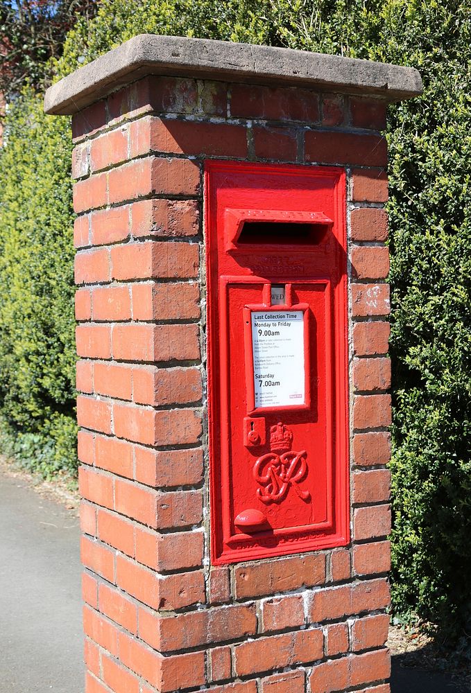Red post box. Free public domain CC0 photo.
