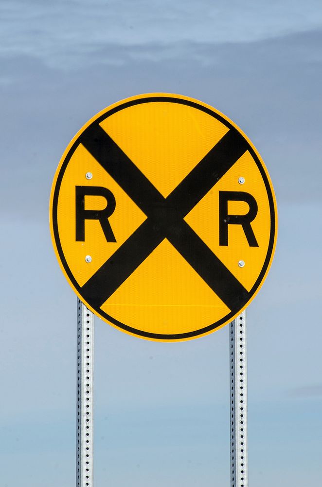 Railroad crossing sign. Free public domain CC0 photo.