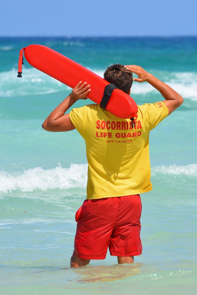 Lifeguard at the beach. Free public domain CC0 photo.