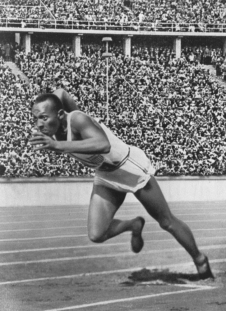 Jesse Owens sprinting, Berlin, Germany, 26 October 2012. View public domain image source here