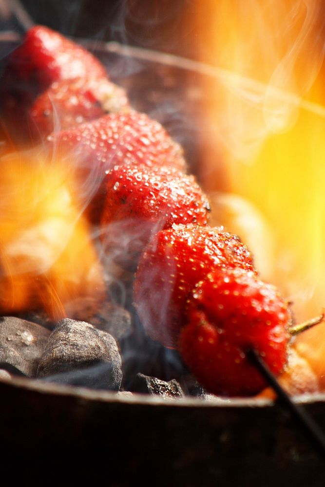 Strawberry skewer on grill. Free public domain CC0 image.