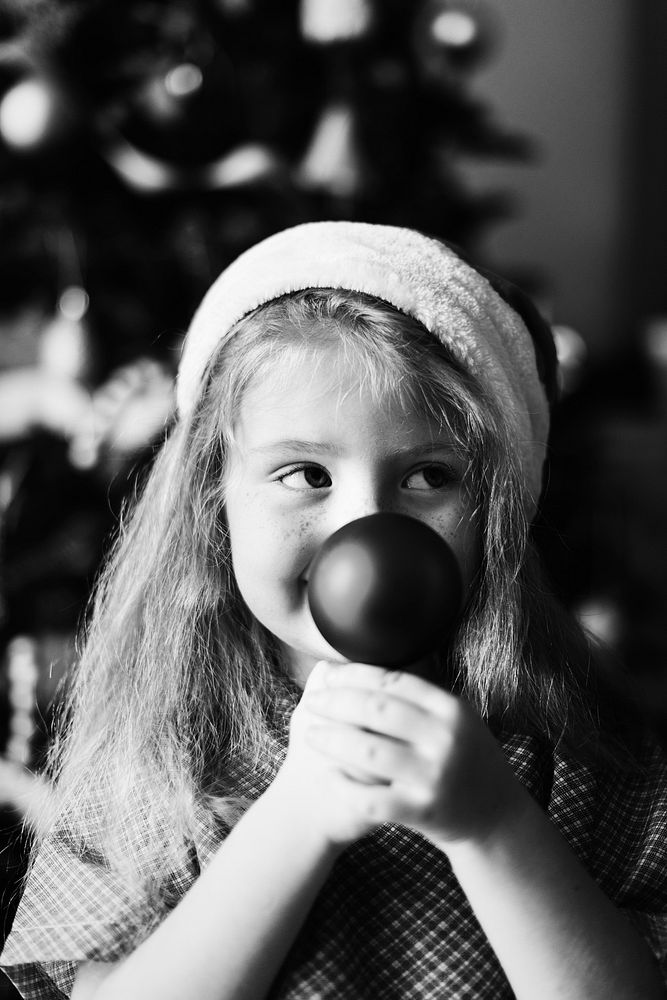 Young Caucasian girl enjoying the Christmas holiday
