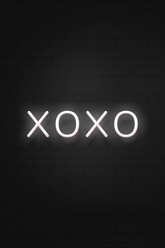 Glowing XOXO neon typography on a black background