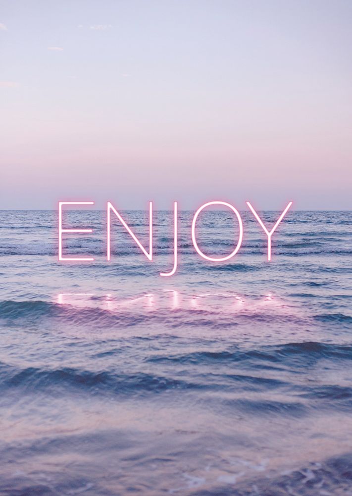 Enjoy pink psd neon word font on sea background