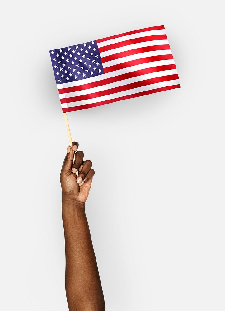Person waving the flag of the United States of America