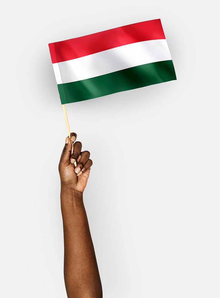 Person waving the flag of Hungary