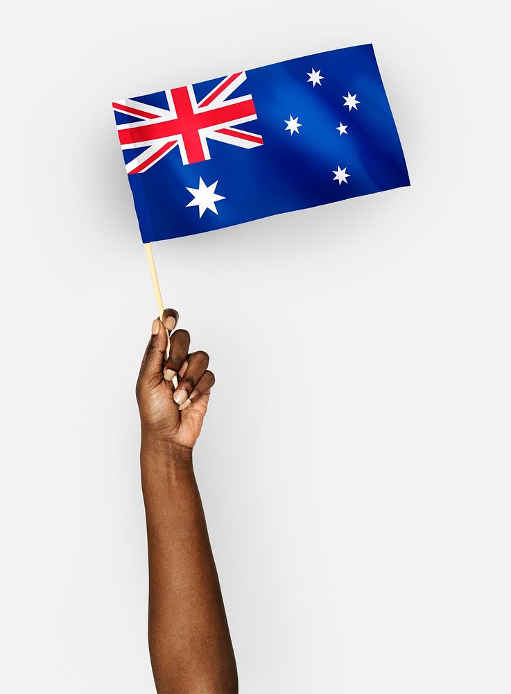 Person waving the flag of Commonwealth of Australia