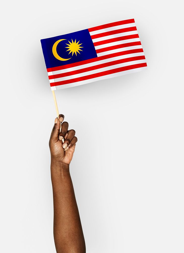 Person waving the flag of Malaysia