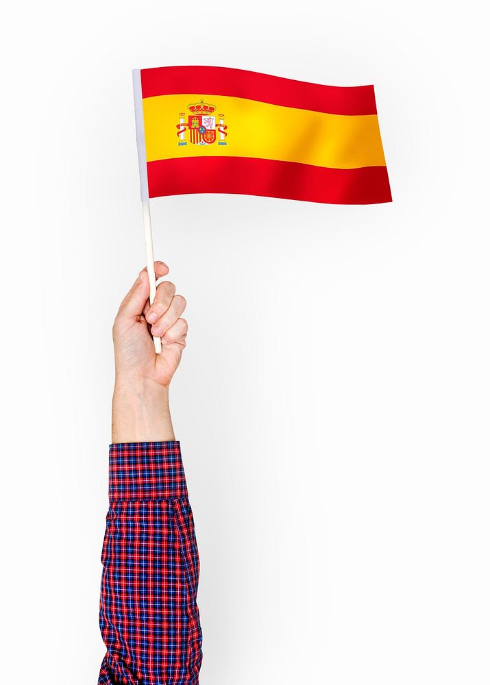 Person waving the flag of Kingdom of Spain