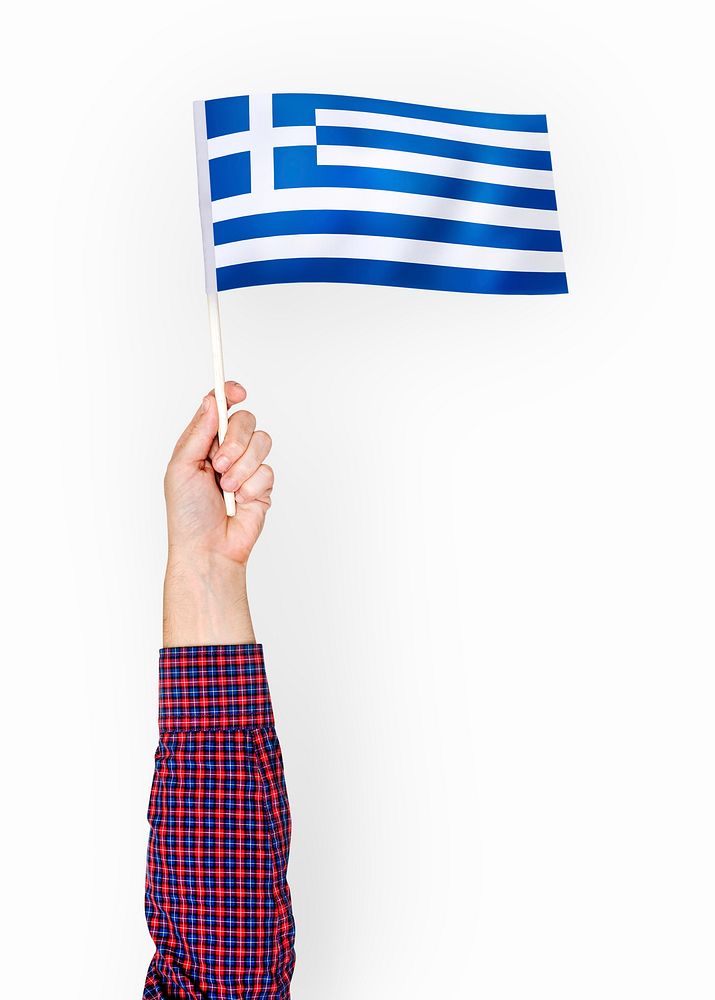 Person waving the flag of Greece