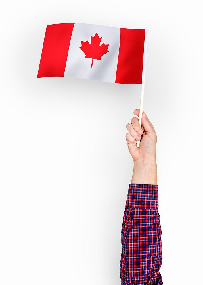 Person waving the flag of Canada