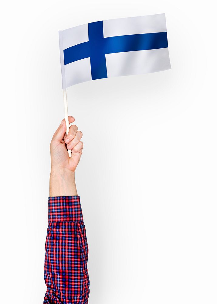 Person waving the flag of Republic of Finland
