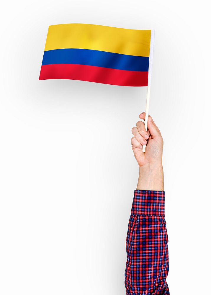 Person waving the flag of Republic of Colombia