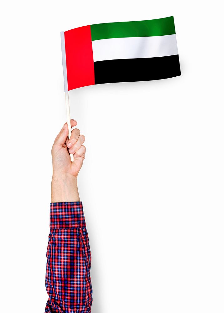 Hand showing flag of United Arab Emirates