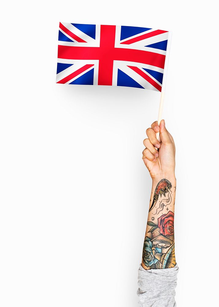 Person waving the flag of United Kingdom of Great Britain and Northern Ireland