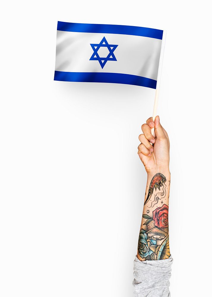 Person waving the flag of State of Israel