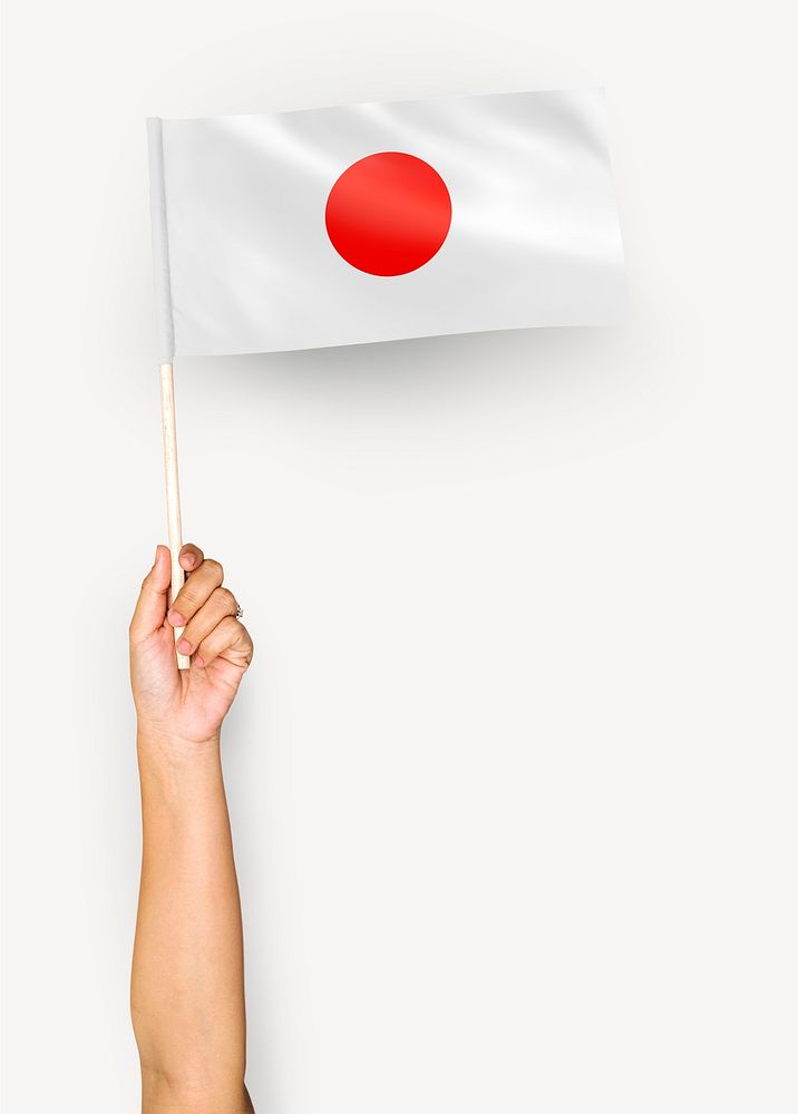 Person waving the flag of Japan