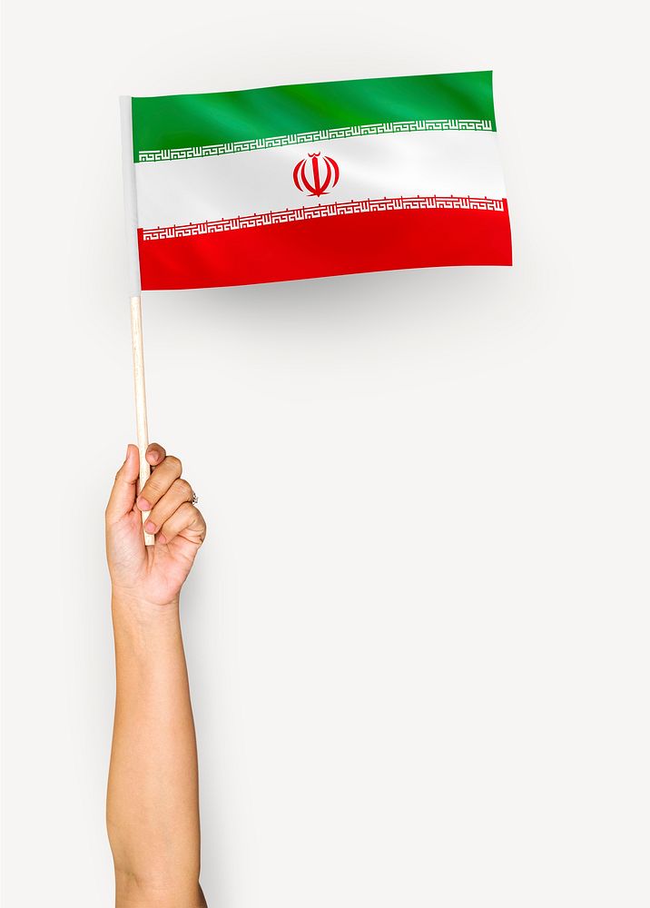 Person waving the flag of Islamic Republic of Iran