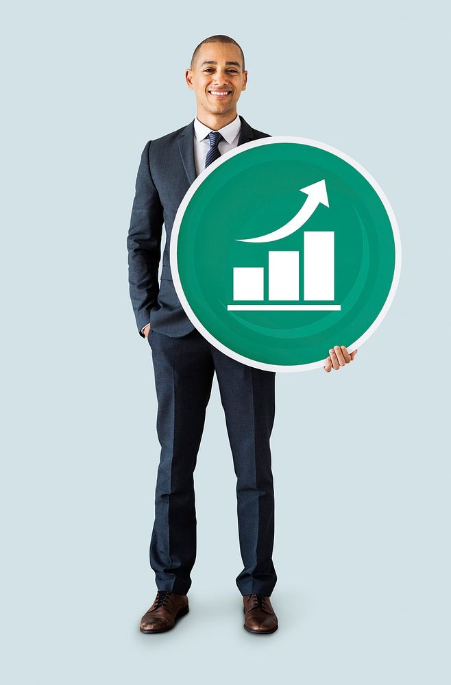 Businessman holding a graph icon